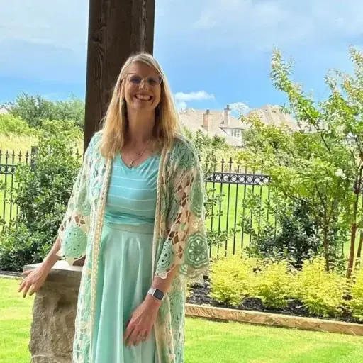 Christian life coach Delanna smiling outdoors, symbolizing hope and healing after betrayal